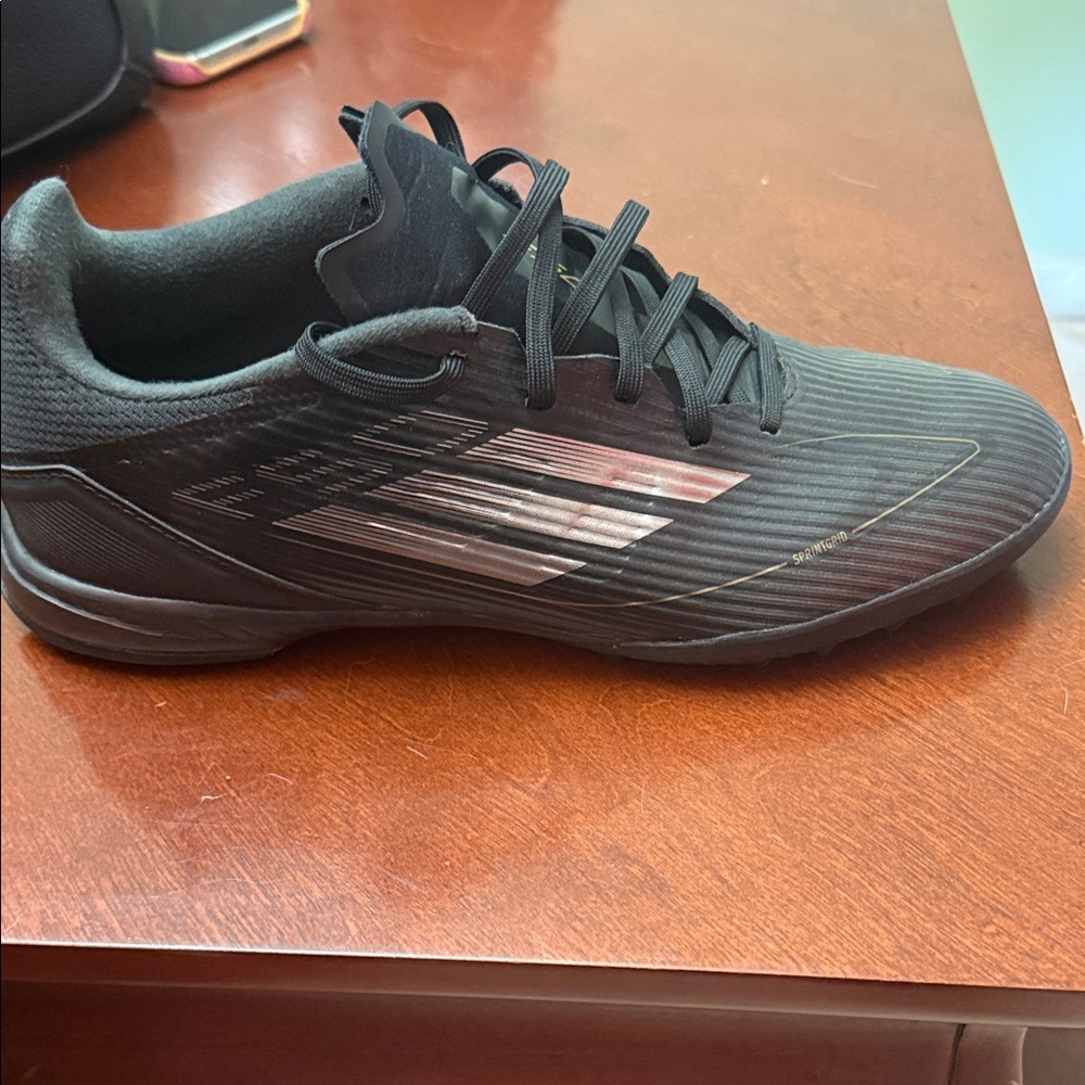 Men's Black Athletic Soccer Shoe with Metallic Accents F50